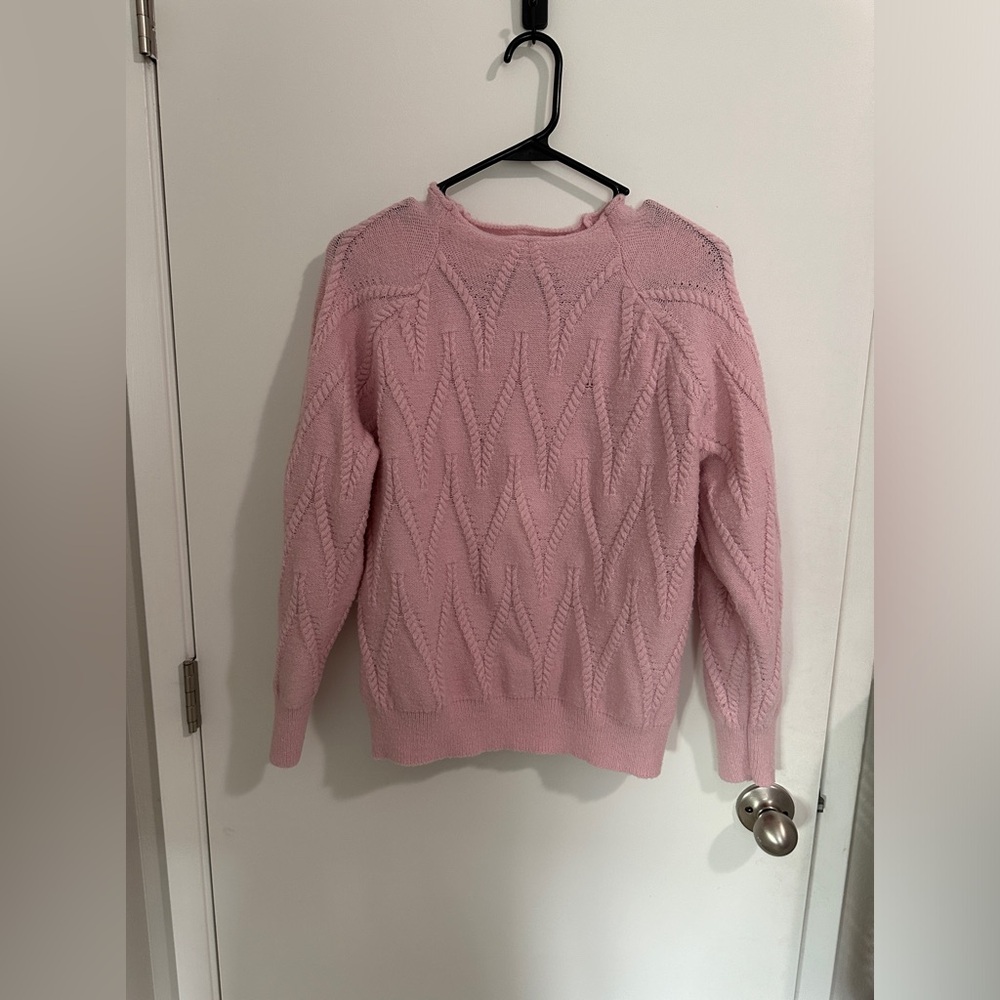 Pink knitted sweater